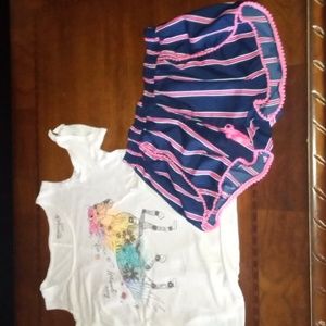 girl large cold shoulder top with blue pink shorts